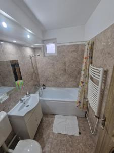 Phòng tắm tại Central Park Aparthotel Turda +8 ảnh