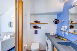 Un baño de Skiff - Transformed studio on the water's edge