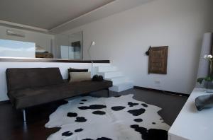 Posezení v ubytování Casa Geniol Luxury villa + 26 fotografií