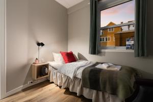 Voodi või voodid majutusasutuse Enter Skansen Hotel toas