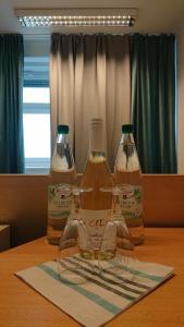 three bottles of milk sitting on top of a table at Bed&Bike Gästezimmer direkt am Werratalradweg in Eschwege in Eschwege