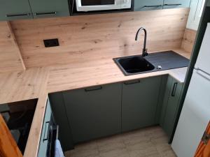 Kuchyň nebo kuchyňský kout v ubytování EXCEPTIONNEL APPARTEMENT EN ESPAGNE