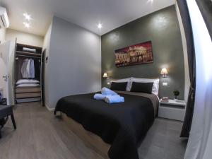 Postel nebo postele na pokoji v ubytování Bed Milano Linate