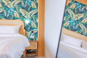 Postel nebo postele na pokoji v ubytování Mellow Poshtel - Kata Beach