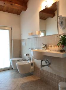 Kúpeľňa v ubytovaní BeeHouse - La Casa delle Api Agriturismo