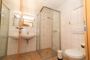 Koupelna v ubytování Pension HOFZWANZIG Dresden-Laubegast + 11 fotografií