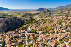 an aerial view of a small town in the mountains at Villa White Cloud in Dalyan