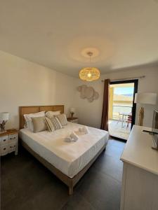 Giường trong phòng chung tại Appartement neuf 6PERS Bel O