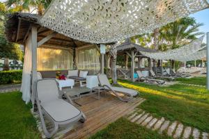 A garden outside Justiniano Deluxe Resort