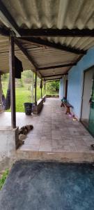 a porch of a building with at Chácara 2 Marias in Novo Gama +1 photo