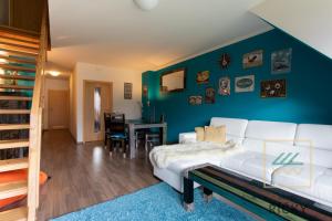 Postel nebo postele na pokoji v ubytování Apartmány pod Zakletým - Hotel Říčky