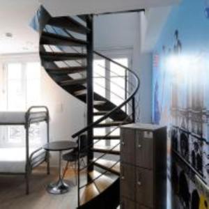 Cama o camas de una habitación en The 3 Ducks Eiffel Tower by Hiphophostels
