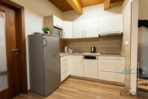 Kuchyň nebo kuchyňský kout v ubytování Apartmány pod Zakletým - Hotel Říčky