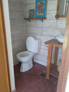 a bathroom with a toilet and a sink at Bayas Coloradas, San Lorenzo, Salta in San Lorenzo +18 photos