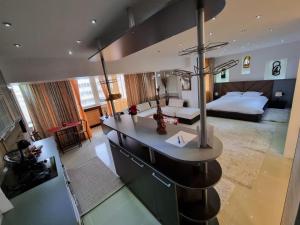 Postel nebo postele na pokoji v ubytování Garsoniera Craiova Centru