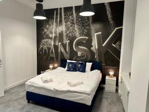 Posteľ alebo postele v izbe v ubytovaní Lunette Apartments - Długi Targ
