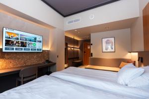 Кровать или кровати в номере Break Sokos Hotel Vuokatti