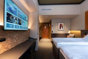 Кровать или кровати в номере Break Sokos Hotel Vuokatti