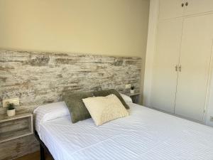 Ein Bett oder Betten in einem Zimmer der Unterkunft Agi Sant Jordi