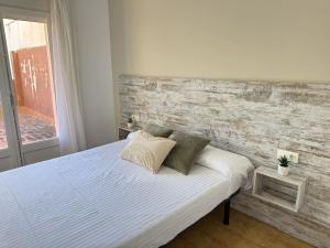 Ein Bett oder Betten in einem Zimmer der Unterkunft Agi Sant Jordi