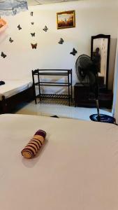 Letto o letti in una camera di Sigiri KP Family Home