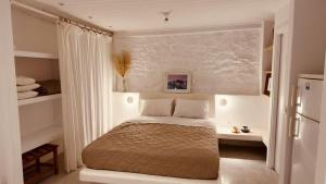 Postel nebo postele na pokoji v ubytování Mykonos Seaview Nests - Tourlos Getaways