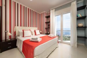 Ένα ή περισσότερα κρεβάτια σε δωμάτιο στο Luxury Villa Alexandros Corfu +20 φωτογραφίες