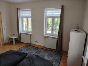 Postel nebo postele na pokoji v ubytování Ruhige Auszeit mit zentraler Anbindung