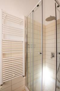 Et badeværelse på Appartamenti Ferdi - Trilocale o Mansarda