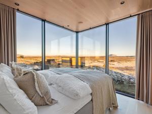 Postel nebo postele na pokoji v ubytování ÖÖD Hekla Horizon - Mirror Houses