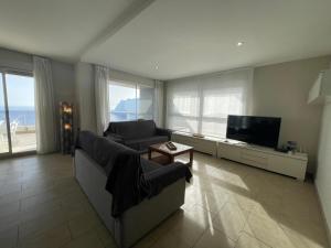 TV a/nebo společenská místnost v ubytování Apartamentos Entremares - Grupo Antonio Perles