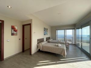 Postel nebo postele na pokoji v ubytování Apartamentos Entremares - Grupo Antonio Perles
