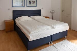 Postel nebo postele na pokoji v ubytování Hotel Eilenriede