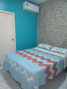 Postel nebo postele na pokoji v ubytování Hotel Dorado Inn