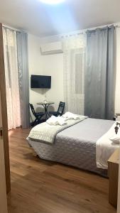 Postel nebo postele na pokoji v ubytování JULIET N - Rental Rooms Verona