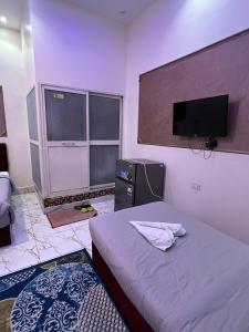 TV a/nebo společenská místnost v ubytování New One Hotel