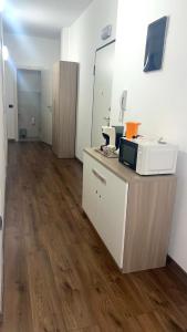 Kuchyň nebo kuchyňský kout v ubytování JULIET N - Rental Rooms Verona