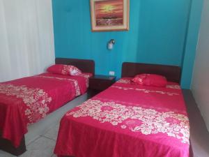 Postel nebo postele na pokoji v ubytování Hotel Dorado Inn