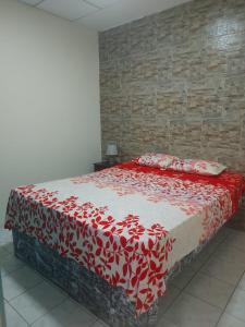 Postel nebo postele na pokoji v ubytování Hotel Dorado Inn