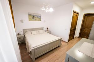 Postel nebo postele na pokoji v ubytování Casa Andra