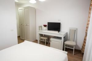 TV a/nebo společenská místnost v ubytování Casa Andra