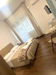Postel nebo postele na pokoji v ubytování JULIET N - Rental Rooms Verona