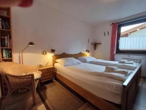 Ένα ή περισσότερα κρεβάτια σε δωμάτιο στο Apartment Barbara in Maishofen