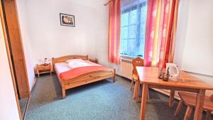 Łóżko lub łóżka w pokoju w obiekcie Villa Medica