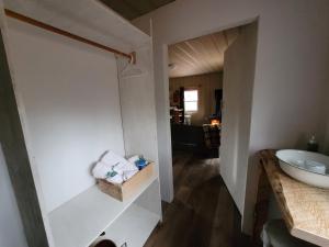 a bathroom with a white sink and a mirror at Edelweiss Inn Nova Scotia in Middleton +156 photos