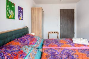 Postel nebo postele na pokoji v ubytování Felsenkeller Appartements
