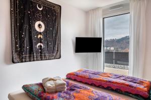 Postel nebo postele na pokoji v ubytování Felsenkeller Appartements