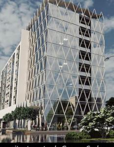 a large office building with a lot of windows at S O P H I A room by 50 shades in Baia Mare