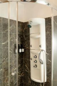 a shower in a bathroom with a glass door at Vineyard & Craft House - Rare 6 bedroom Gem in Picton in Picton +37 photos