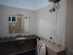 Koupelna v ubytování Prashanth Family Homestay